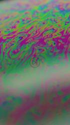 Close up view of the abstract surface of a soap bubble[免费商用竖屏]