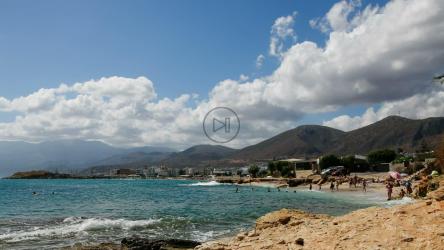 希腊海滩度假者的时间流逝[]