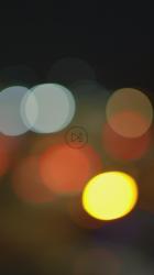 夜晚林荫道的散焦景观[免费商用竖屏]