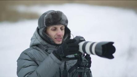 在户外冬季拍摄的摄影师[]