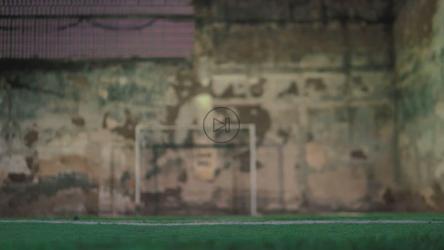 Ball bouncing on the soccer field floor and a player scoring a goal[免费商用]