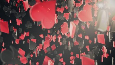 Red and black poker figures falling, 3D[]