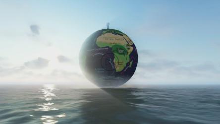 一个男人在海面上的地球仪模型[]