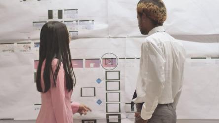 Woman in a suit approves the work of her office colleague[4K免费商用]