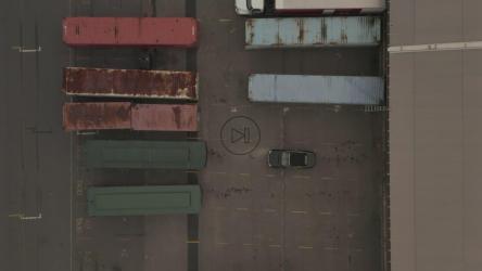 Trailers parked outside a warehouse[4K]