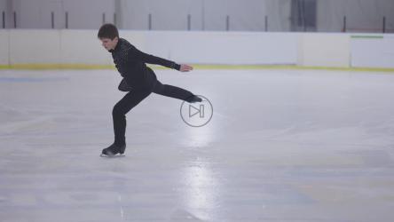 Figure skater man practicing figure skating jumps[]