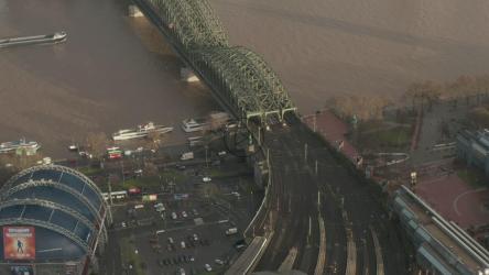 Vehicular bridge crossing the river, aerial view[]