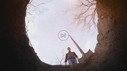 Person filling a hole in the ground[4K]