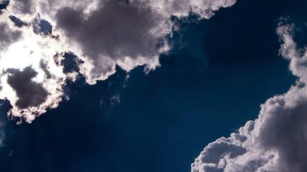 Bright sunshine hidden behind a cloud[]