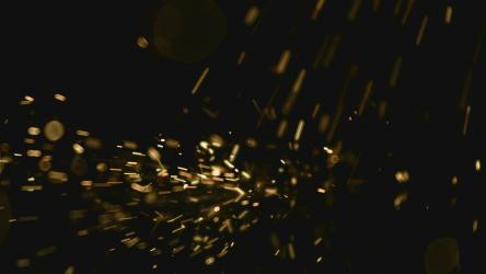 火花落入黑色表面[]