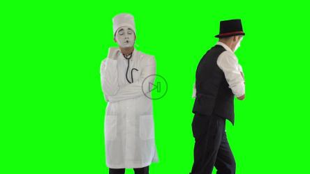 Mimes在绿色屏幕上模仿医生和病人[]