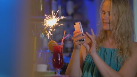 Woman taking a photo of her cocktail[4K]